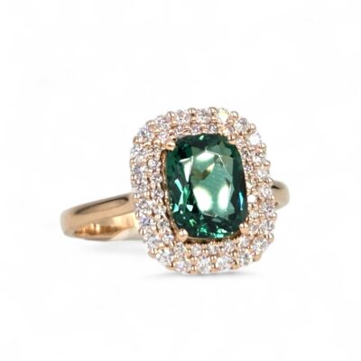 bague or rose diamants et pierre verte