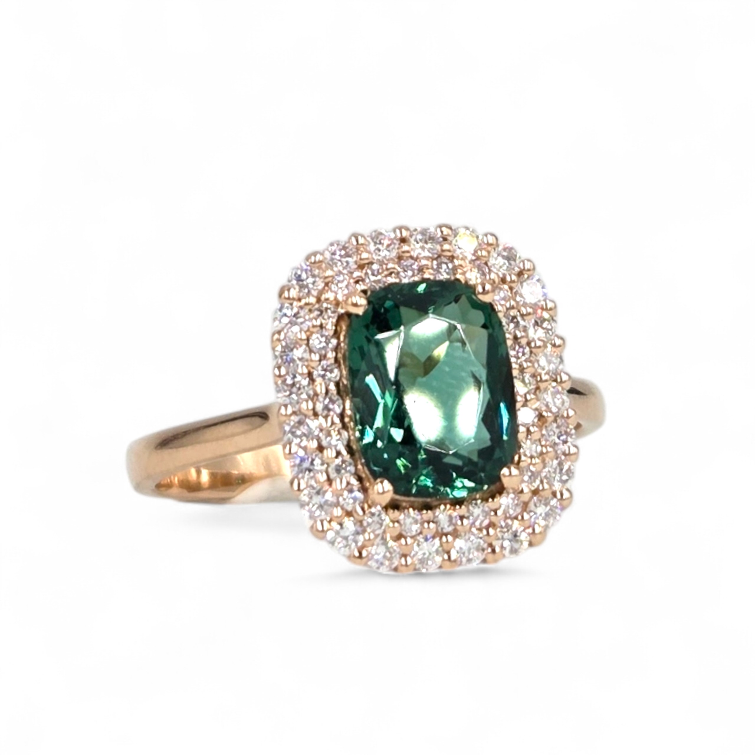 bague or rose diamants et pierre verte